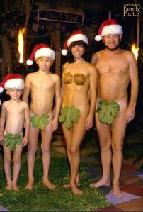 Now this is one of those Christmas photos that makes me scratch my head and wonder, "What the hell were these parents on to think that this was a good idea?" Also, the parents look as if they've just stepped out from a tanning salon.