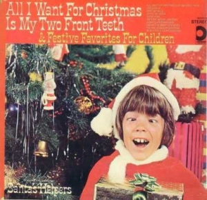 At least if this kid had some form of corrective vision surgery, he might be significantly less creepy than he seems in this album cover. Seriously, what were they thinking?