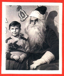 Of course, I'm sure that while the kid seems perfectly composed, Santa seems to be a bit pissed. Then again, imagine if you had to deal with reindeer pooping on people's roofs.
