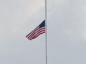 To fly a flag at half staff is a sign of a nation in mourning. This is usually done upon deaths of high elected official, days of remembrance, and upon presidential proclamation.