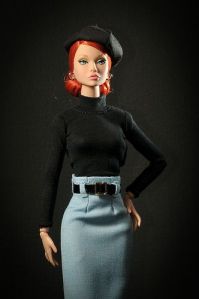 Now this might not be a Barbie. And I'm definitely sure she's not supposed to be a French gangster's moll. However, her outfit and facial expression suggests that she's straight from a French gangster movie.