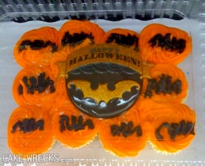 Those are bats? Seriously, they just look black scribbles on orange icing. 