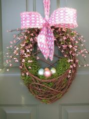 This one even has moss in it and flowers on the handle. And the pink flowers are tied up with a pink polka dot bow.