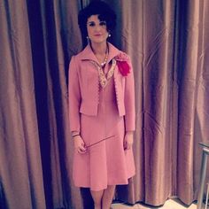 Sure she might be dressed like Jackie Kennedy. But she's a sadistic witch who'd force you to write in blood if she thinks you're lying.