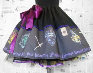 This one has all house signs and other magical things. Still, love the purple bow.