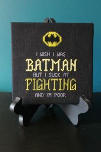 Says, "I wish I was Batman but I suck at fighting and I'm poor." Kind of says the same about me. But I could always write Batman parodies and fan fiction. Maybe I should write one about him in therapy.