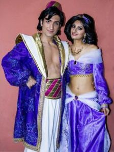 I guess this is what Aladdin and Jasmine wore at the end. And Al always has to have a bare chest. But at least they match.