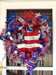 Yes, it says "God Bless America" on it with a heart shaped wreath. But it surely looks patriotic and festive to me. So it goes on this post.