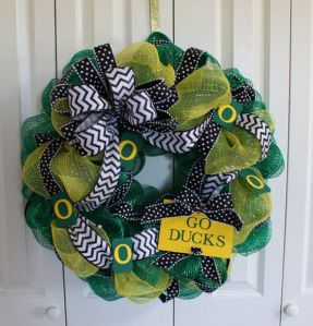 This one has the Oregon University colors as well as a ribbon. Love the decorations on this.