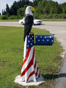 Not only is this mailbox and stand painted like an American flag, but it even has a bald eagle on top. Guess someone must have too much time on their hands.