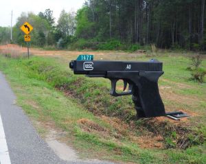 No wonder this mailbox belongs to an NRA member who doesn't believe in gun control. Probably a place I want to avoid.