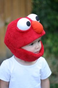 After all, Elmo's so adorable. Even has an opening to keep their chin warm. So cute.