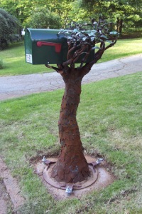 Then again, that's not really a tree. And the mailbox is supposed to be held up in the branches.