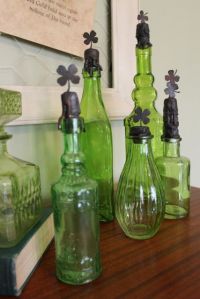 Not sure how to make the shamrock tops. But whoever did certainly has some interesting green bottles.