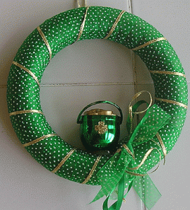 Helps that the wreath is in polka dots and gold trim. And the pot of gold is green and shiny.